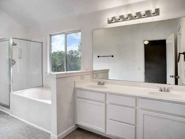 117 High Point Blvd, Cedar Creek, TX 78612 - bathroom featuring a stall shower, a bath, double vanity, and tile patterned flooring