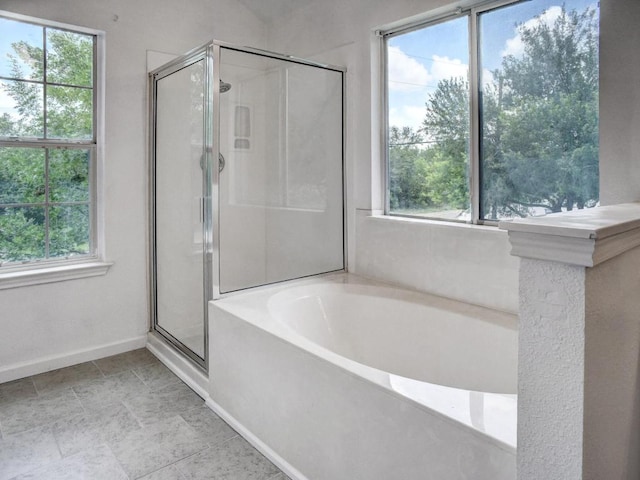 117 High Point Blvd, Cedar Creek, TX 78612 - full bath featuring a stall shower and a garden tub