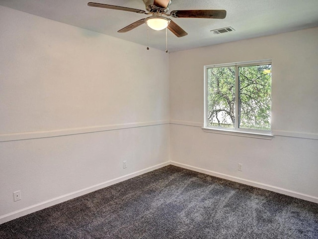 117 High Point Blvd, Cedar Creek, TX 78612 - unfurnished room featuring dark colored carpet and a ceiling fan