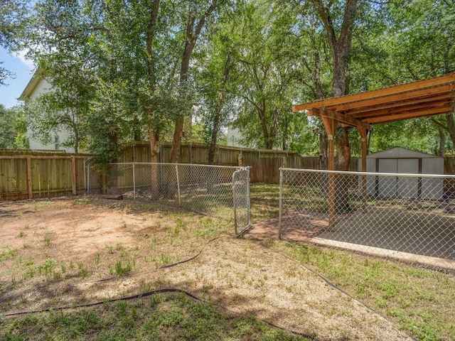 117 High Point Blvd, Cedar Creek, TX 78612 - fenced backyard with a storage unit