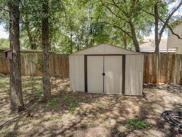 117 High Point Blvd, Cedar Creek, TX 78612 - view of shed with a fenced backyard