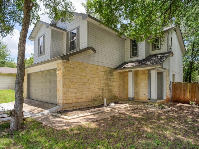 117 High Point Blvd, Cedar Creek, TX 78612 - view of front of property with stone siding, an attached garage, driveway, and roof with shingles