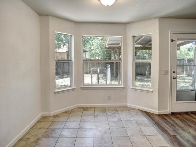 117 High Point Blvd, Cedar Creek, TX 78612 - spare room with light tile patterned floors and baseboards