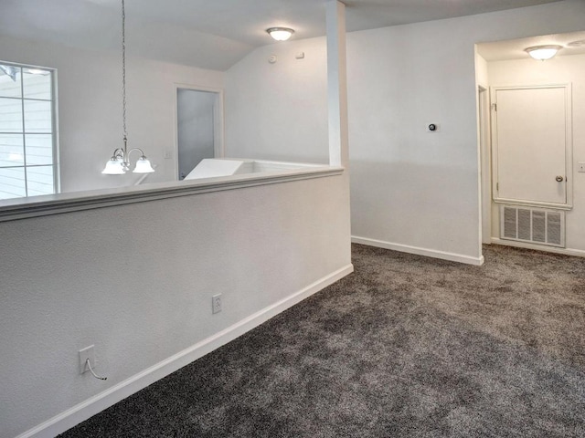 117 High Point Blvd, Cedar Creek, TX 78612 - carpeted empty room featuring vaulted ceiling and a chandelier