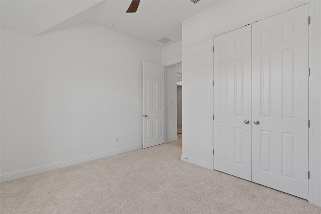 20240 Smedley Dr, Pflugerville, TX 78660 - unfurnished bedroom with carpet flooring, a ceiling fan, a closet, and vaulted ceiling