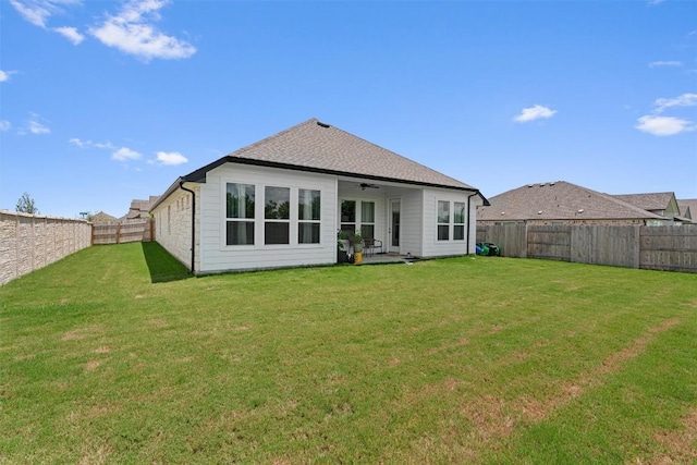20240 Smedley Dr, Pflugerville, TX 78660 - back of property with ceiling fan, a fenced backyard, and a patio area