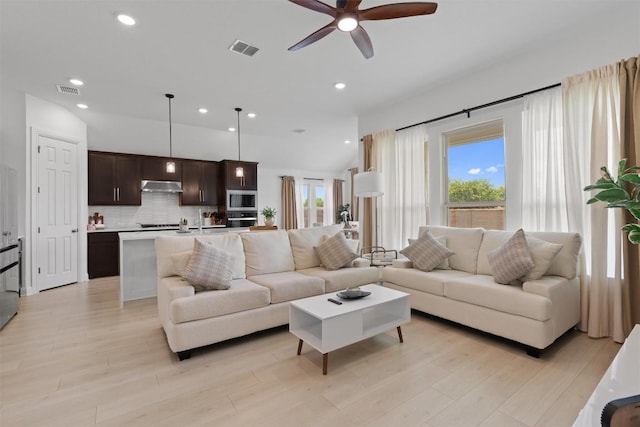 20240 Smedley Dr, Pflugerville, TX 78660 - living room featuring a ceiling fan, light wood finished floors, and recessed lighting
