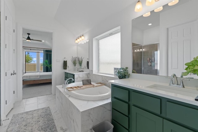 20240 Smedley Dr, Pflugerville, TX 78660 - full bathroom featuring two vanities, ensuite bathroom, a bath, a stall shower, and ceiling fan