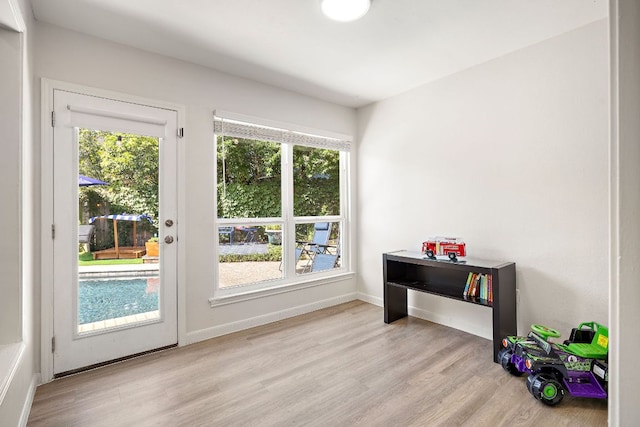 15002 Wells Port Dr, Austin, TX 78728 - rec room with wood finished floors and plenty of natural light