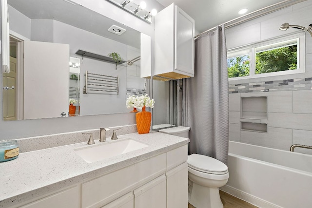 15002 Wells Port Dr, Austin, TX 78728 - bathroom with vanity, shower / bath combo with shower curtain, and wood finished floors
