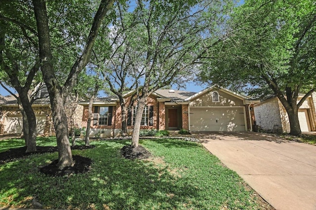 3413 Latimer Dr, Austin, TX 78732 - single story home featuring a garage, driveway, brick siding, and a front yard