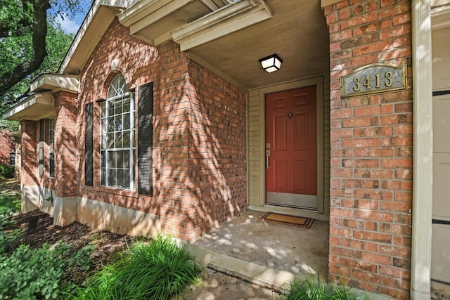3413 Latimer Dr, Austin, TX 78732 - property entrance with brick siding
