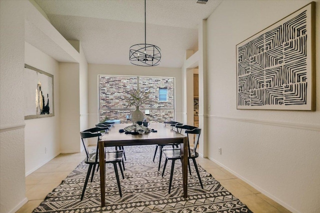 3413 Latimer Dr, Austin, TX 78732 - dining room featuring light tile patterned floors