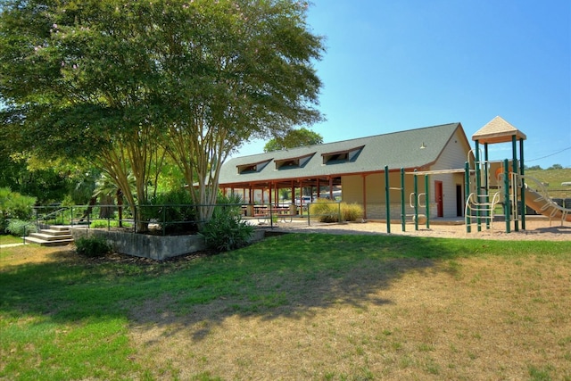 3413 Latimer Dr, Austin, TX 78732 - rear view of house featuring a playground and a yard