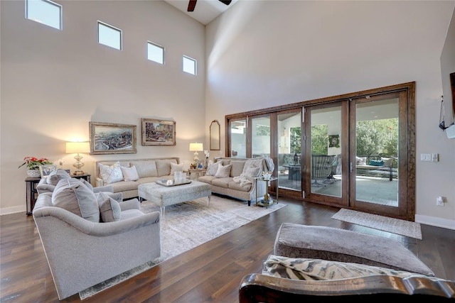 3973 River Place Blvd, Austin, TX 78730 - living room featuring a high ceiling, a ceiling fan, and dark wood finished floors