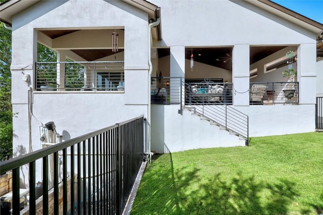3973 River Place Blvd, Austin, TX 78730 - view of home's exterior with stucco siding and a yard