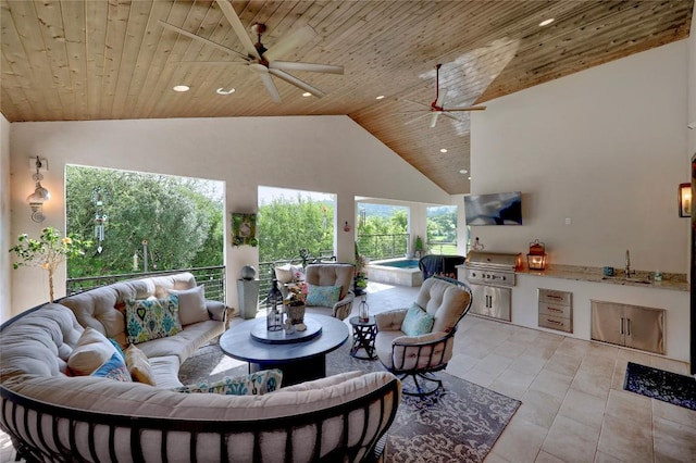 3973 River Place Blvd, Austin, TX 78730 - living area with ceiling fan, wooden ceiling, recessed lighting, high vaulted ceiling, and light tile patterned floors