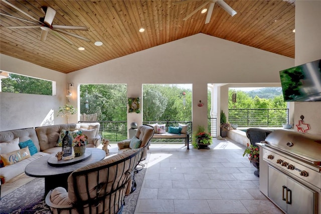 3973 River Place Blvd, Austin, TX 78730 - tiled living room with a ceiling fan, vaulted ceiling, recessed lighting, and wood ceiling