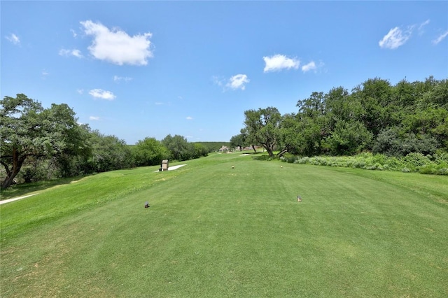 3973 River Place Blvd, Austin, TX 78730 - view of community with view of scattered trees, golf course view, and a yard