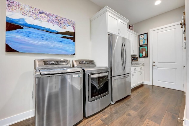 3973 River Place Blvd, Austin, TX 78730 - laundry area with washing machine and clothes dryer, dark wood finished floors, cabinet space, and recessed lighting