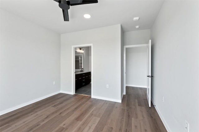 4510 Terry-O Ln Unit 230, Austin, TX 78745 - unfurnished bedroom with dark wood finished floors, ensuite bathroom, and ceiling fan
