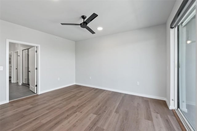 4510 Terry-O Ln Unit 230, Austin, TX 78745 - unfurnished bedroom featuring wood finished floors and ceiling fan
