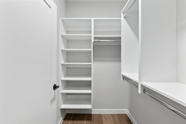 4510 Terry-O Ln Unit 230, Austin, TX 78745 - walk in closet featuring dark wood-type flooring