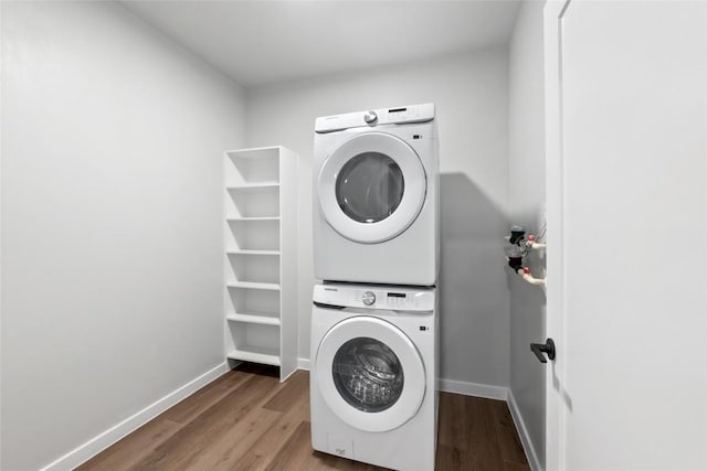 4510 Terry-O Ln Unit 230, Austin, TX 78745 - laundry area featuring estacked washer and dryer and wood finished floors