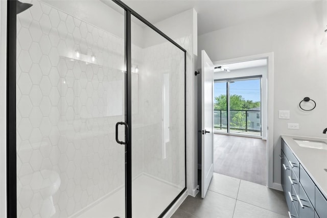 4510 Terry-O Ln Unit 230, Austin, TX 78745 - full bath with vanity, a stall shower, and tile patterned floors