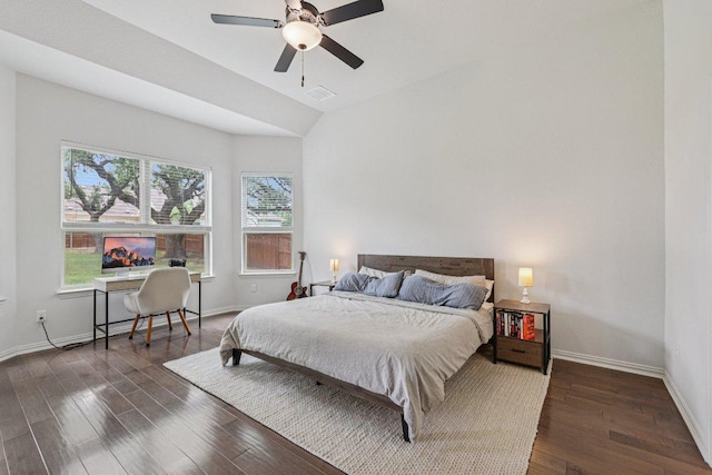 958 Pink Granite Blvd, Dripping Springs, TX 78620 - bedroom with dark wood-style flooring, vaulted ceiling, and a ceiling fan