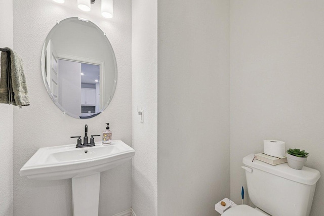 958 Pink Granite Blvd, Dripping Springs, TX 78620 - bathroom featuring toilet and a sink