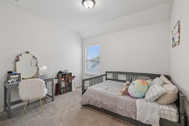 958 Pink Granite Blvd, Dripping Springs, TX 78620 - carpeted bedroom featuring vaulted ceiling and baseboards