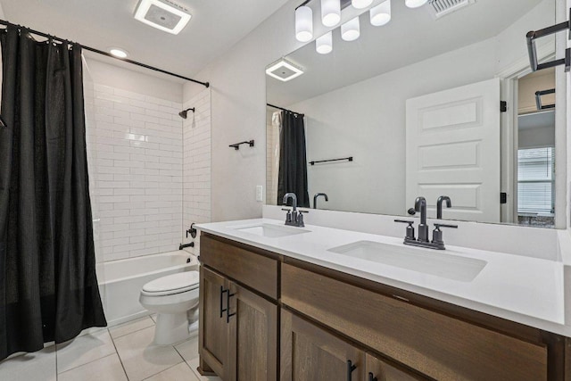 958 Pink Granite Blvd, Dripping Springs, TX 78620 - full bath with shower / bath combo with shower curtain, double vanity, and tile patterned floors