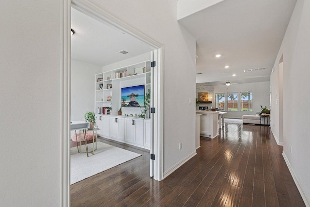 958 Pink Granite Blvd, Dripping Springs, TX 78620 - corridor with dark wood finished floors and recessed lighting