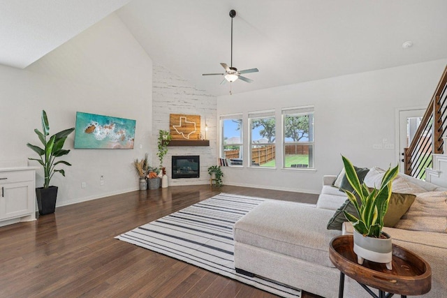 958 Pink Granite Blvd, Dripping Springs, TX 78620 - living area featuring high vaulted ceiling, ceiling fan, wood finished floors, and a fireplace