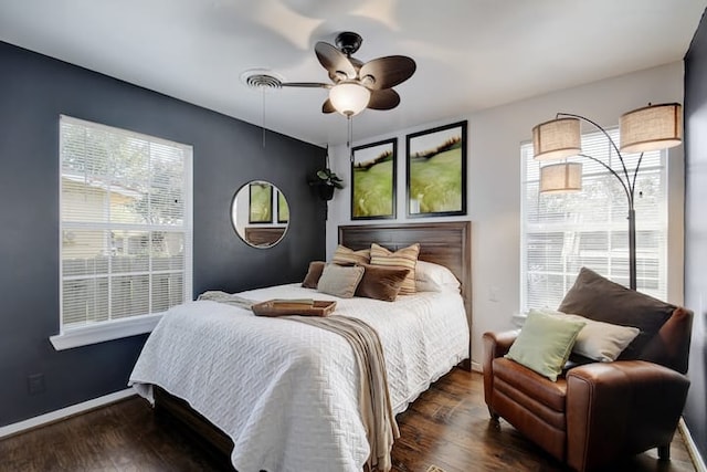 313 Rowland Dr, Austin, TX 78745 - bedroom with wood finished floors and ceiling fan