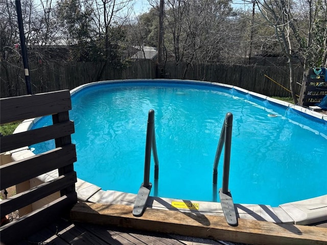 313 Rowland Dr, Austin, TX 78745 - view of swimming pool with a fenced backyard
