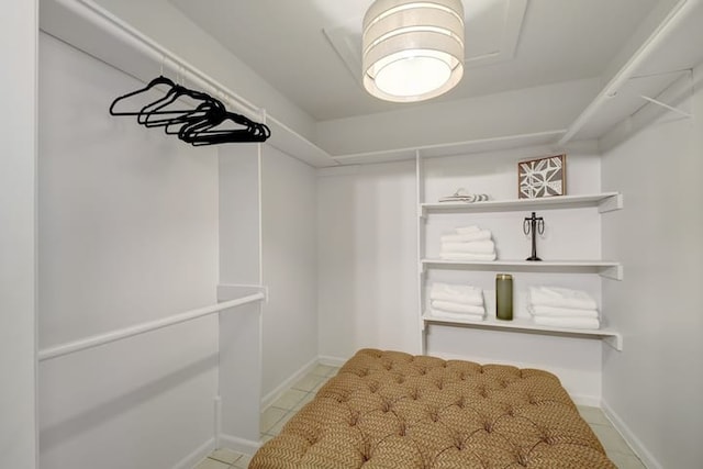 313 Rowland Dr, Austin, TX 78745 - spacious closet featuring light tile patterned flooring