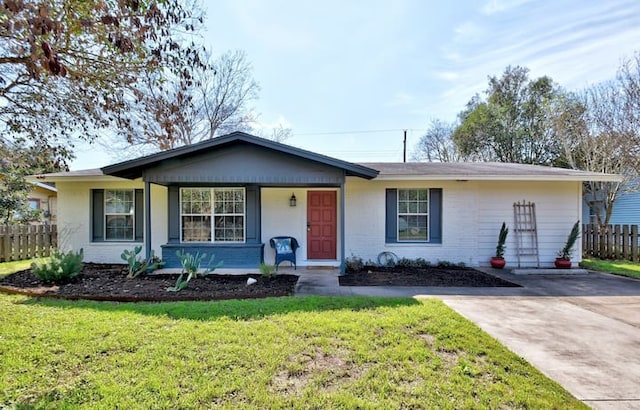 313 Rowland Dr, Austin, TX 78745 - ranch-style house with covered porch, concrete driveway, and brick siding