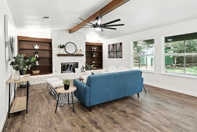 2207 Emerald Isle Dr, Leander, TX 78641 - living area featuring a ceiling fan, wood finished floors, and a large fireplace
