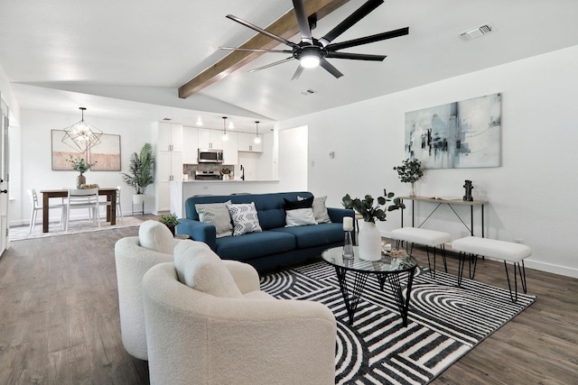 2207 Emerald Isle Dr, Leander, TX 78641 - living area featuring dark wood-type flooring, ceiling fan, and a chandelier