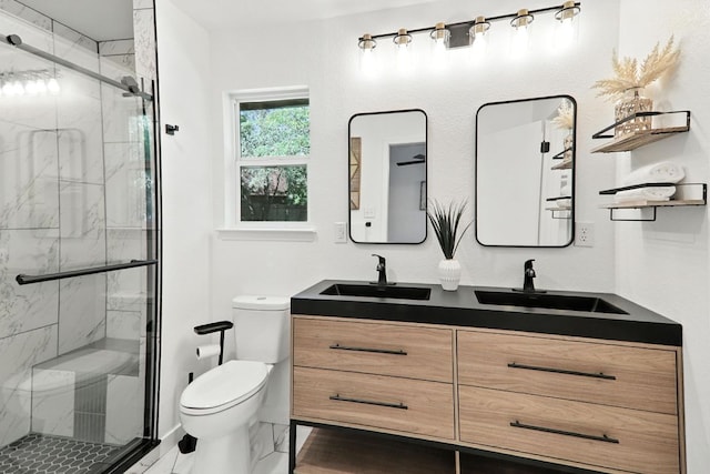 2207 Emerald Isle Dr, Leander, TX 78641 - bathroom with double vanity, a marble finish shower, and marble look tiles