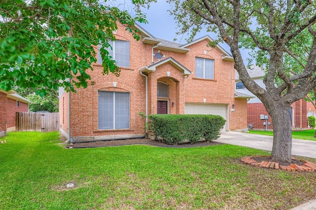 6050 Almelo Dr, Round Rock, TX 78681 - traditional-style home featuring brick siding, an attached garage, and driveway