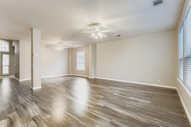 6050 Almelo Dr, Round Rock, TX 78681 - unfurnished living room featuring dark wood finished floors and ceiling fan