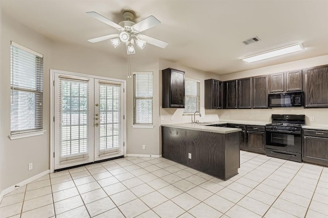 6050 Almelo Dr, Round Rock, TX 78681 - kitchen with black appliances, french doors, a peninsula, a ceiling fan, and plenty of natural light