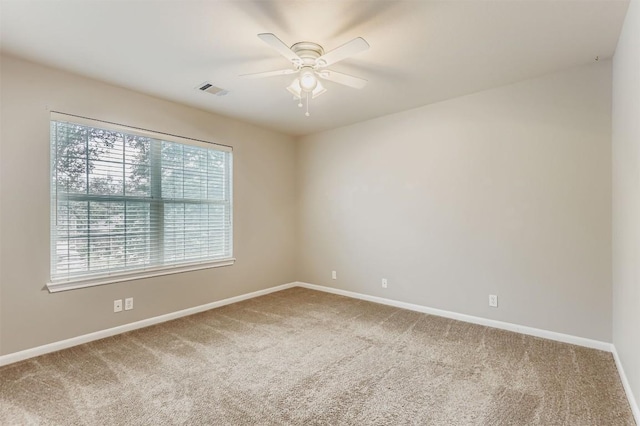 6050 Almelo Dr, Round Rock, TX 78681 - spare room featuring carpet floors and ceiling fan
