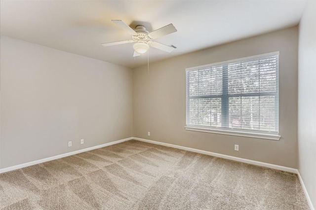6050 Almelo Dr, Round Rock, TX 78681 - empty room featuring light carpet and a ceiling fan