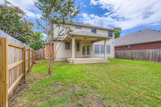 6050 Almelo Dr, Round Rock, TX 78681 - back of house featuring french doors and a fenced backyard