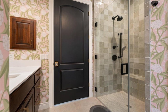 205 Versilia Cir, Lakeway, TX 78734 - bathroom featuring wallpapered walls, a shower stall, and vanity