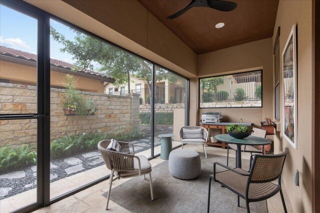 205 Versilia Cir, Lakeway, TX 78734 - sunroom / solarium featuring ceiling fan, plenty of natural light, stone tile floors, and recessed lighting